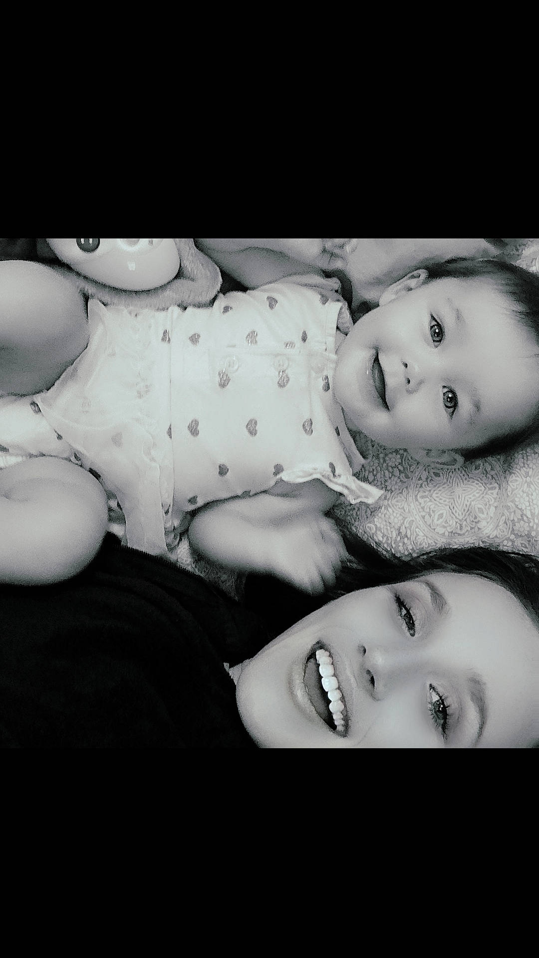 baby, black_and_white, blanket, child, closeup, clothing, cute, eyes, face, family, happy, infant, joy, love, lying_down, person, portrait, smile, together, woman