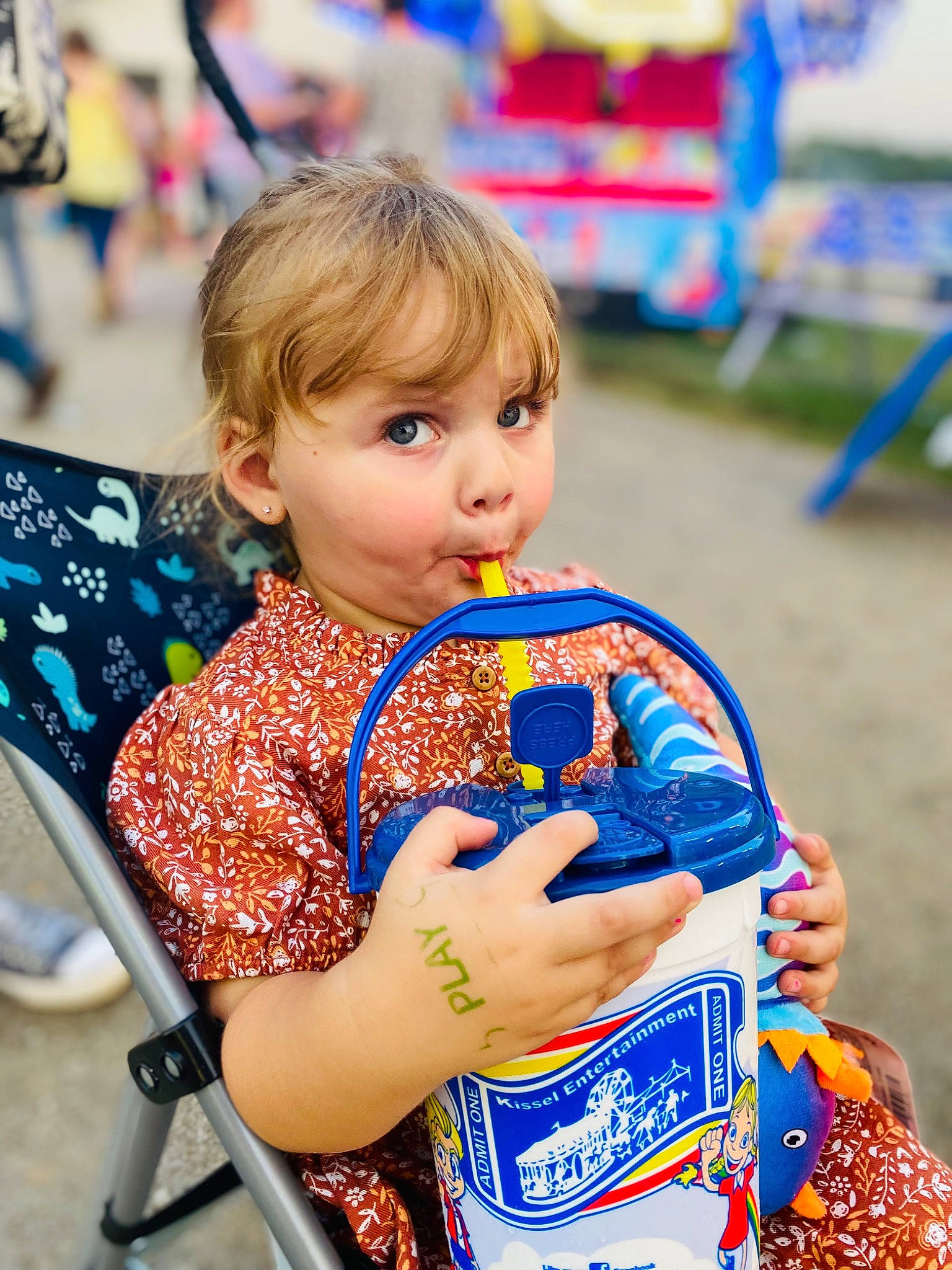 Amberlee joined the competition — help win amazing prizes! child, city, electric_blue, event, facial_expression, fun, hairstyle, happy, leisure, market, person, photograph, play, public_space, recreation, sitting, snapshot, summer, surprise, t_shirt