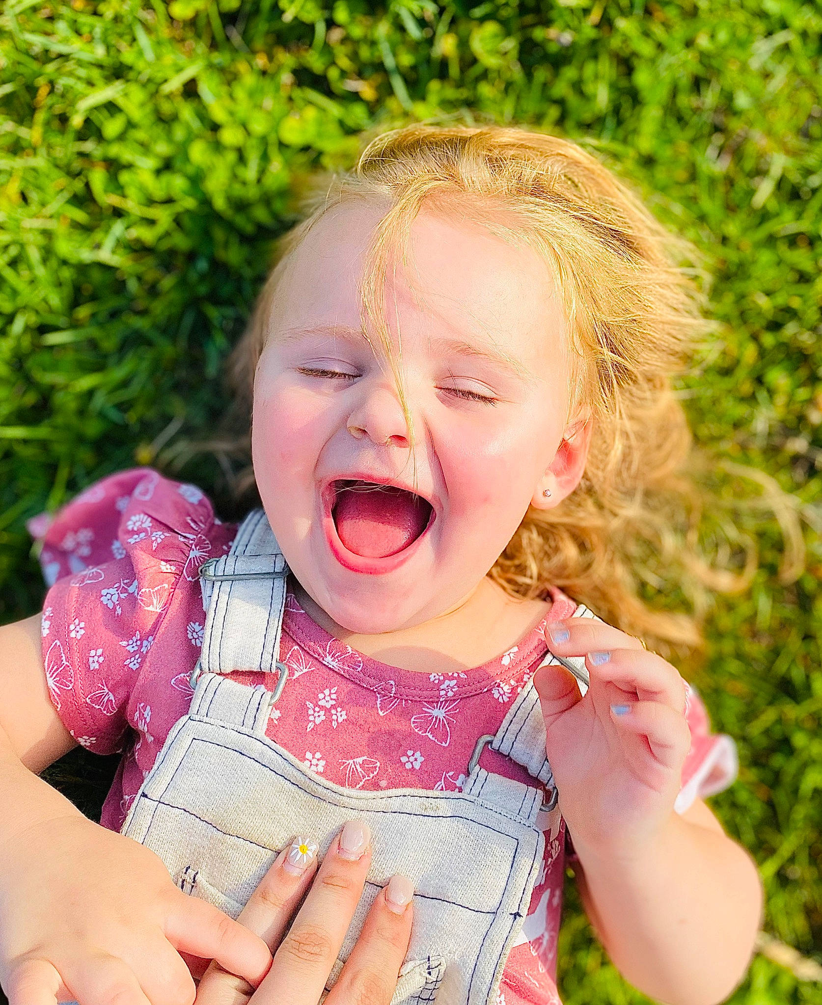 Amberlee is registered to the contest to win money with this photo: baby, baby_laughing, baby_toddler_clothing, cheek, child, finger, gesture, grass, happy, iris, lip, mouth, nose, people_in_nature, person, pink, plant, skin, smile, summer