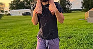 Cy joined the competition — help win amazing prizes! barefoot, beard, casual_clothing, child, clouds, daylight, grass, greenery, man, nature, outdoor, person, portrait, shorts, shoulder_ride, sky, sunset, toddler, trees, tshirt
