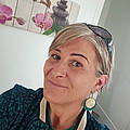 Nat K. V.