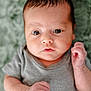 baby, infant, face, eyes, hands, onesie, gray_clothing, closeup, portrait, soft_texture, blanket, curious, newborn, skin, expression, child, cute, lying_down, indoors, young