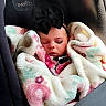 Dallas is registered to the contest to win money with this photo: baby, car_seat, blanket, bow, child, sleeping, infant, seat_belt, cozy, cute, portrait, child_seat, fluffy, pink, black_bow, car, travel, wrapped, adorable, resting