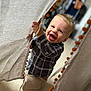 Aylé participe au concours pour gagner de l'argent avec cette photo : toddler, child, smiling, curtains, indoor, happy, blond_hair, plaid_shirt, beige, pom_poms, fabric, candid, playful, cute, person, portrait, small_child, baby, expression, clothing