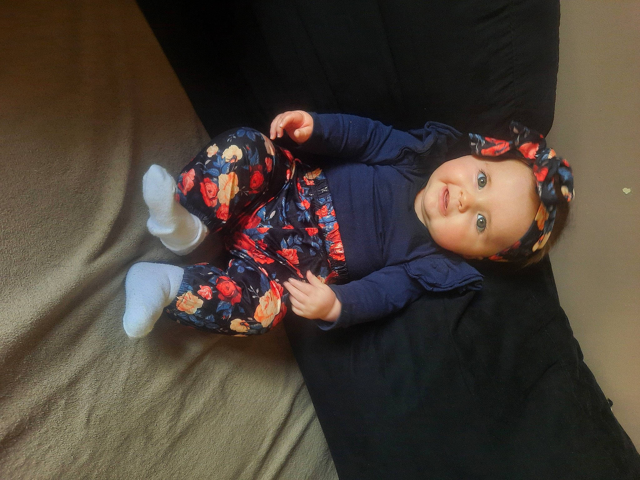 Victoire participe au concours pour gagner de l'argent avec cette photo : baby, baby_toddler_clothing, carmine, child, comfort, costume, flash_photography, flooring, fun, hardwood, person, plant, room, sitting, skin, sleeve, sock, toddler, toy, tree