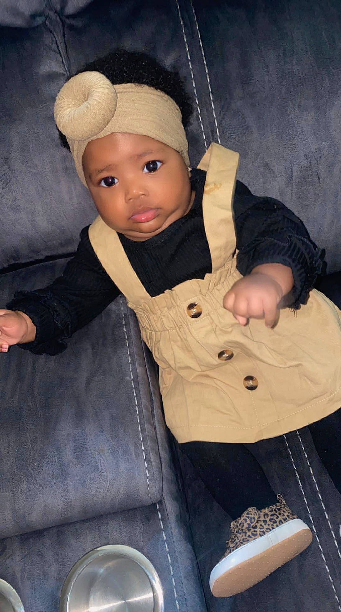 Brooklynn joined the competition — help win amazing prizes! baby, baby_products, baby_toddler_clothing, button, cap, cheek, collar, denim, fashion_accessory, finger, fur, hand, headwear, outerwear, person, personal_protective_equipment, sitting, sleeve, thumb, toddler