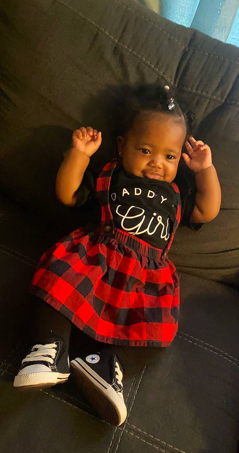 Brooklynn joined the competition — help win amazing prizes! baby, baby_toddler_clothing, black_hair, cool, dress, flash_photography, flooring, fun, hairstyle, happy, human_body, lip, nose, pattern, person, plaid, sitting, sleeve, t_shirt, tartan