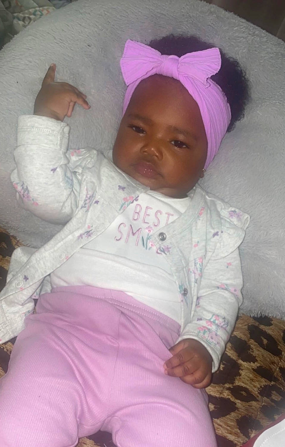 Brooklynn is registered to the contest to win money with this photo: baby, baby_toddler_clothing, cheek, comfort, eye, happy, head, headwear, human_body, linens, magenta, mouth, person, pink, purple, skin, sleeve, smile, textile, toddler