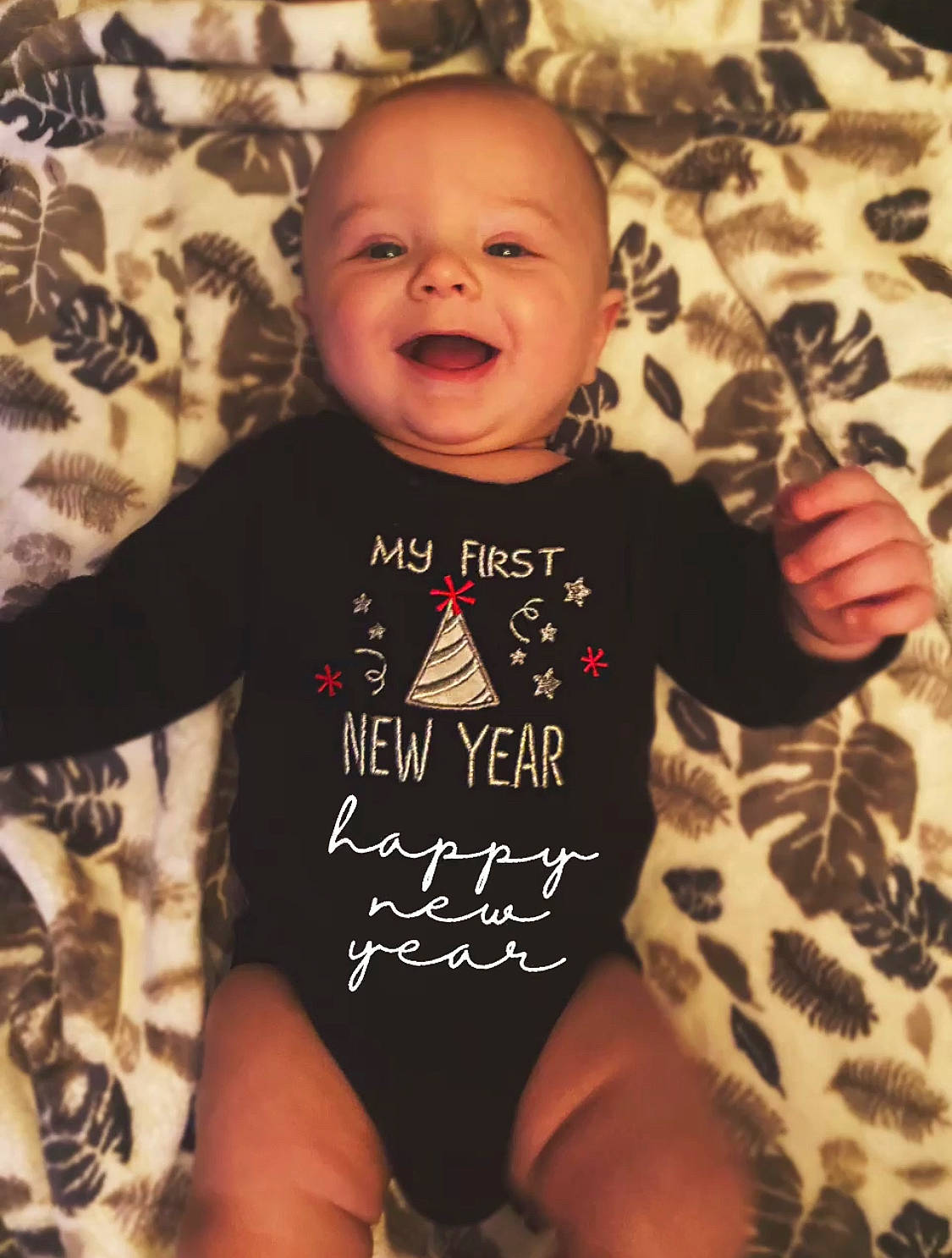 Landon joined the competition — help win amazing prizes! arm, baby_toddler_clothing, black, cheek, clothing, eye, face, facial_expression, hairstyle, hand, head, human_body, neck, nose, organ, person, photograph, skin, sleeve, smile