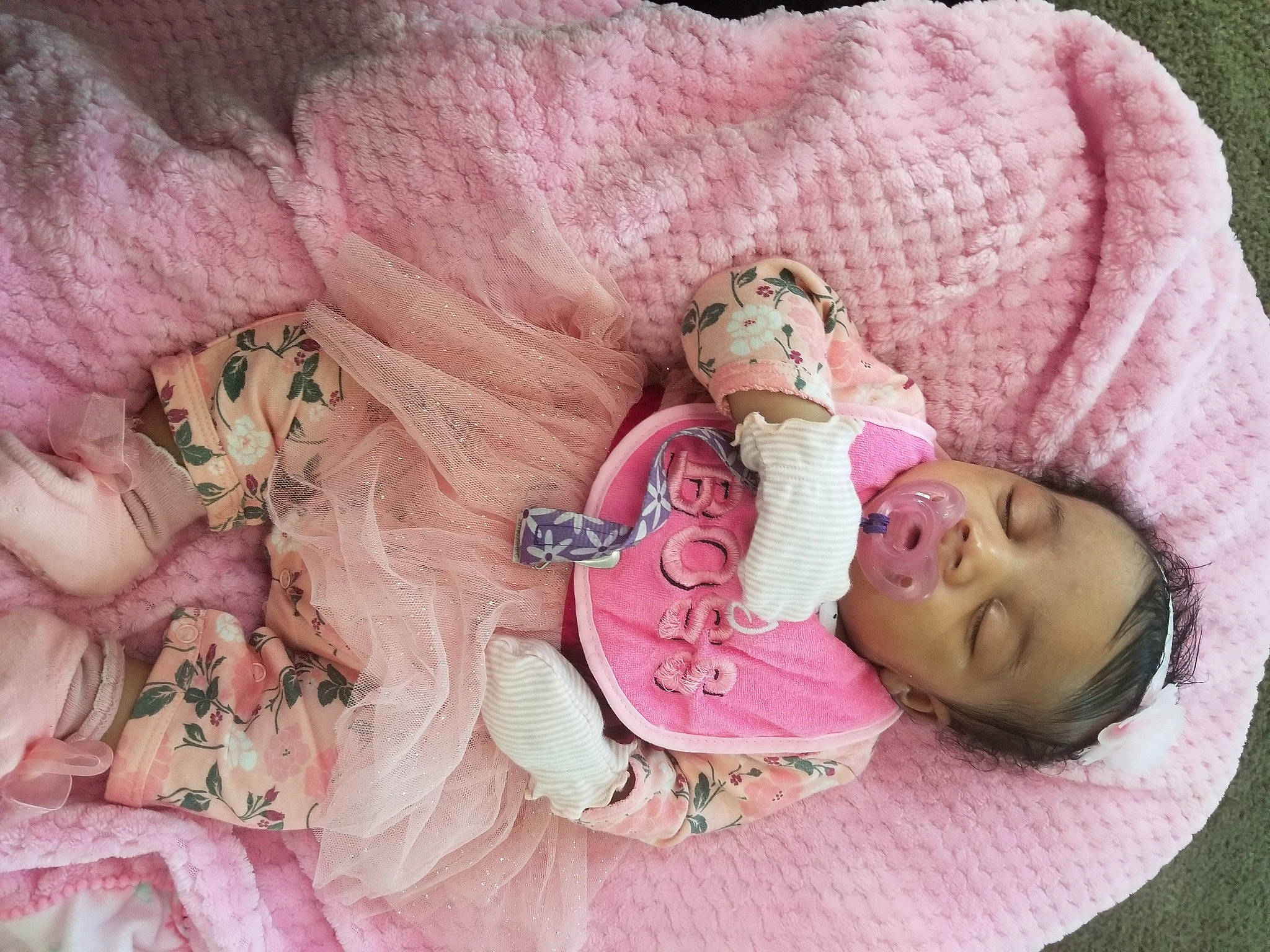 Queen is registered to the contest to win money with this photo: baby, baby_products, baby_sleeping, baby_toddler_clothing, bedtime, birth, child, flower, linens, person, photography, pink, plant, product, room, sleep, textile, toddler