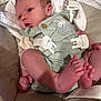 Nathan joined the competition — help win amazing prizes! baby, newborn, infant, overalls, baby_seat, feet, hands, face, blue_eyes, cute, comfortable, cushion, fabric, straps, wooden_buttons, bunny_patch, skin, indoors, portrait, child