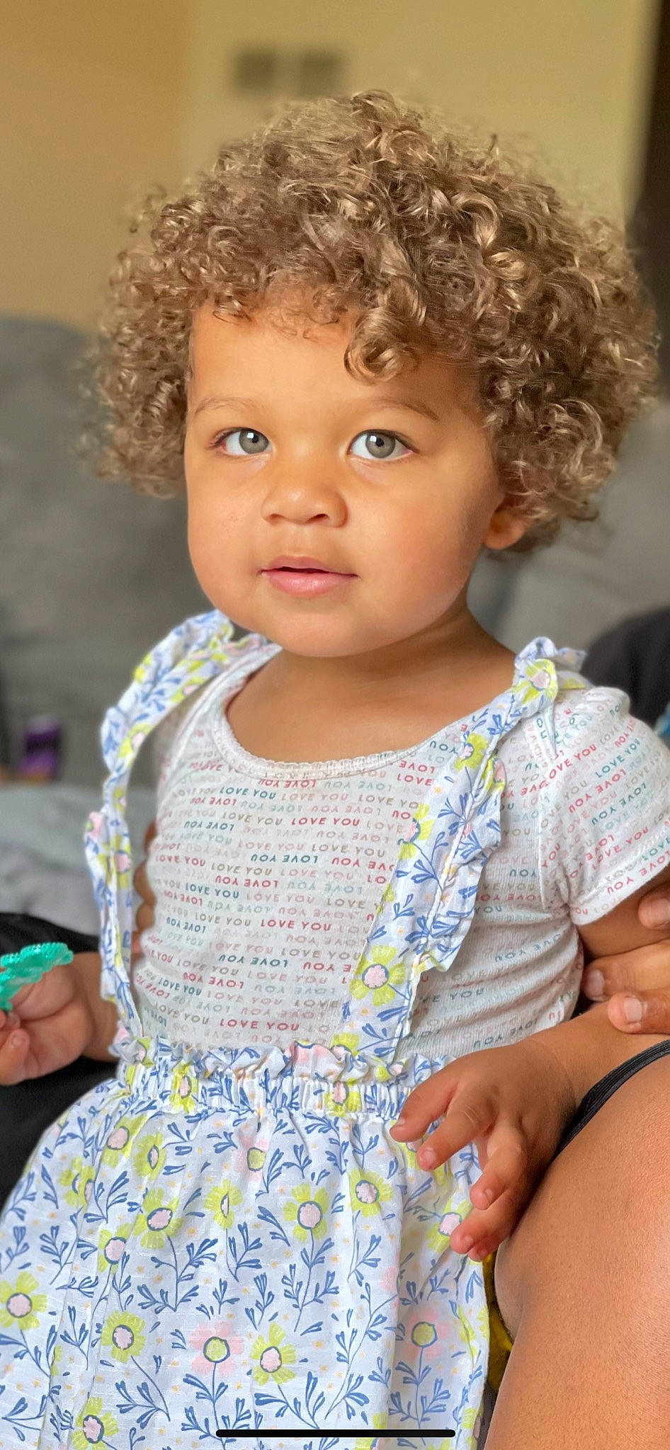 Neveah joined the competition — help win amazing prizes! baby_toddler_clothing, cheek, chin, dress, facial_expression, fashion, hair, hairstyle, head, human, human_body, jheri_curl, lip, neck, nose, organ, person, shoulder, skin, smile