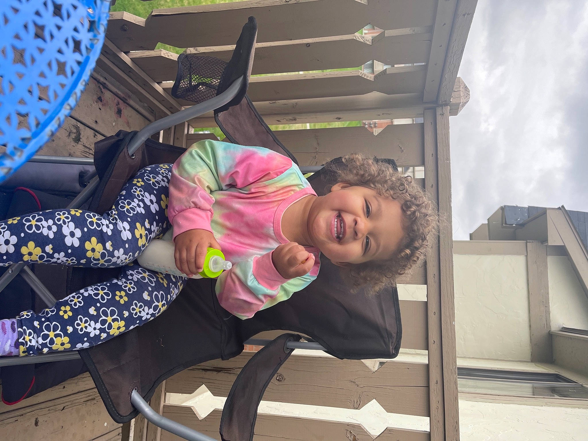 Neveah joined the competition — help win amazing prizes! baby_products, child, city, fun, green, happy, human_leg, joy, leg, leisure, pattern, person, recreation, sandal, sitting, smile, thigh, toddler, travel, tree