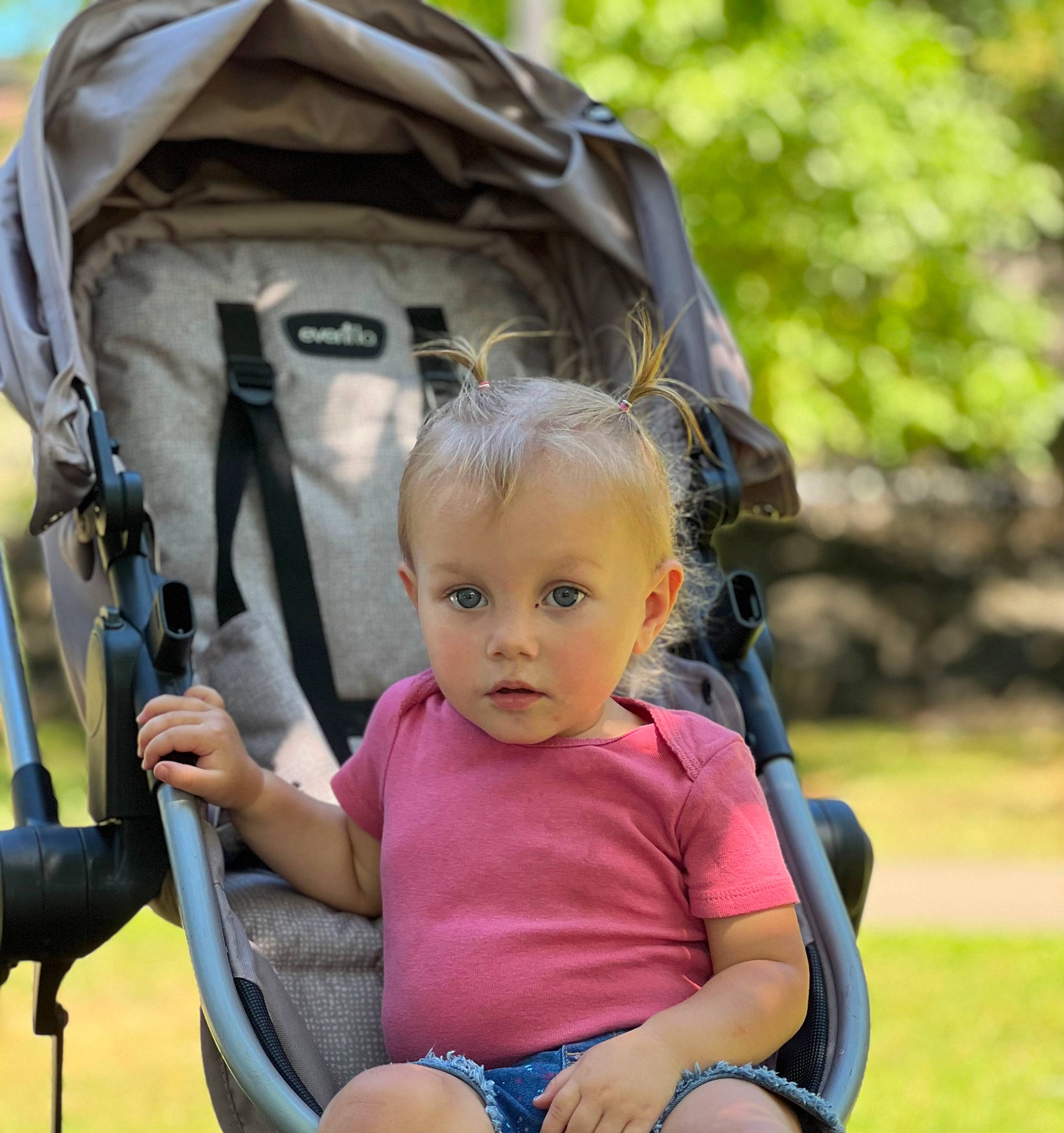 Layla joined the competition — help win amazing prizes! baby, baby_carriage, baby_products, baby_toddler_clothing, bag, child, eye, fun, grass, happy, human, leisure, people_in_nature, person, recreation, sitting, snapshot, spring, toddler, travel