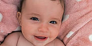 Loanne participe au concours pour gagner de l'argent avec cette photo : adorable, baby, blanket, child, close_up, cozy, cute, expression, eyes, face, happy, heart_pattern, infant, pink, portrait, skin, smiling, soft_texture, warm, young