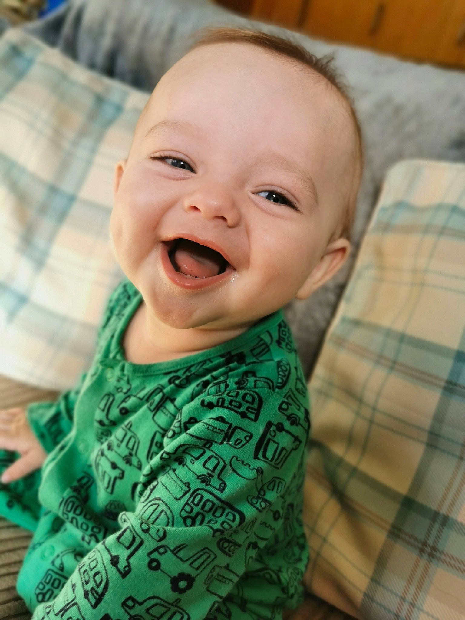 Lyle is registered to the contest to win money with this photo: baby, baby_laughing, cheek, child, chin, eye, face, facial_expression, happy, head, laugh, lip, mouth, nose, person, skin, smile, toddler
