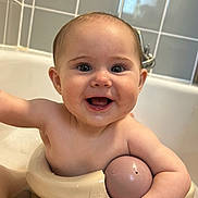 Elsie joined the competition — help win amazing prizes! baby, bath, bathtub, bathroom, child, smiling, toy, water, skin, face, happy, cute, infant, sitting, play, tiled_wall, faucet, arm, head, mouth
