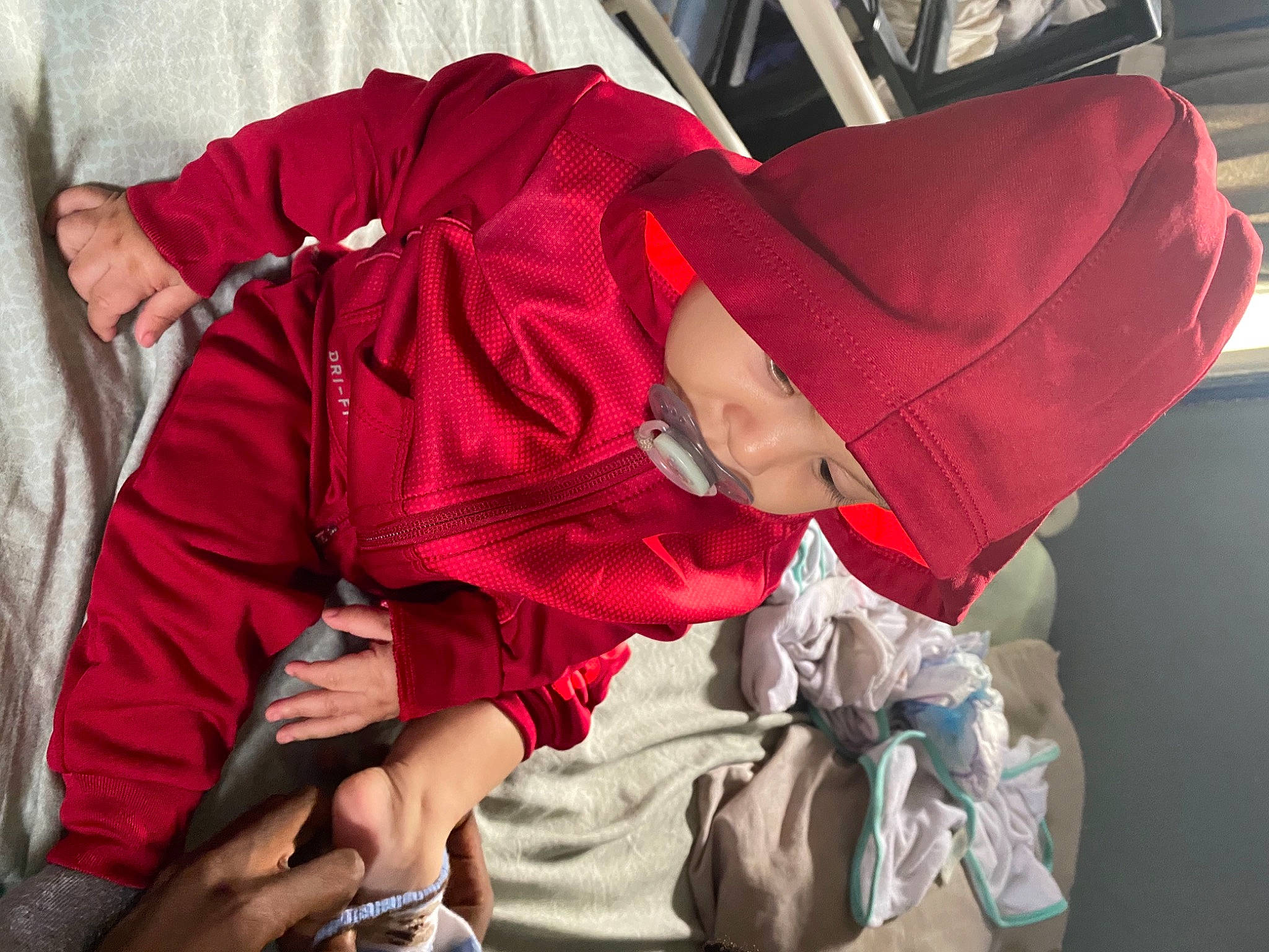 Ermias Harris joined the competition — help win amazing prizes! baby, baby_products, carmine, child, comfort, event, fun, jacket, knee, lap, leisure, magenta, nap, person, purple, sitting, sleep, sleeve, toddler, tradition