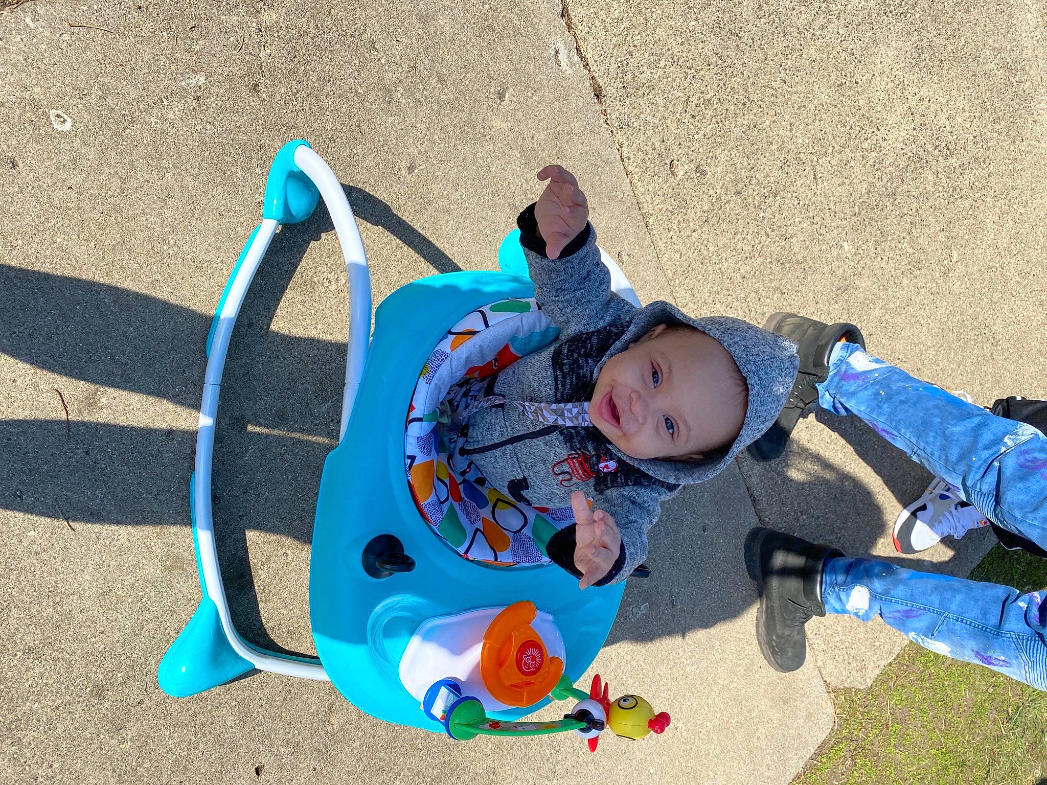 Ermias Harris joined the competition — help win amazing prizes! azure, baby, baby_products, baby_toddler_clothing, child, city, electric_blue, fun, grass, headwear, leisure, outdoor_play_equipment, person, personal_protective_equipment, plastic, play, recreation, shadow, sitting, toddler