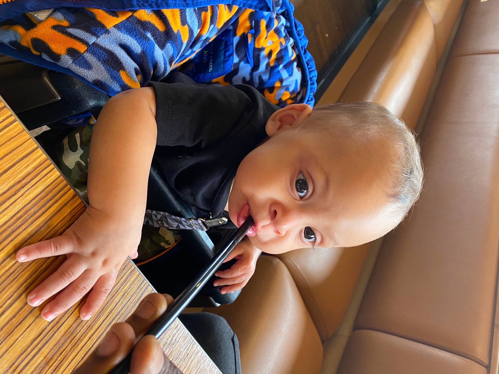 Ermias Harris is registered to the contest to win money with this photo: baby, baby_products, car_seat, chair, child, cutlery, eyelash, finger, fun, hand, mouth, musical_instrument, nail, person, sitting, smile, tableware, thumb, toddler, vacation