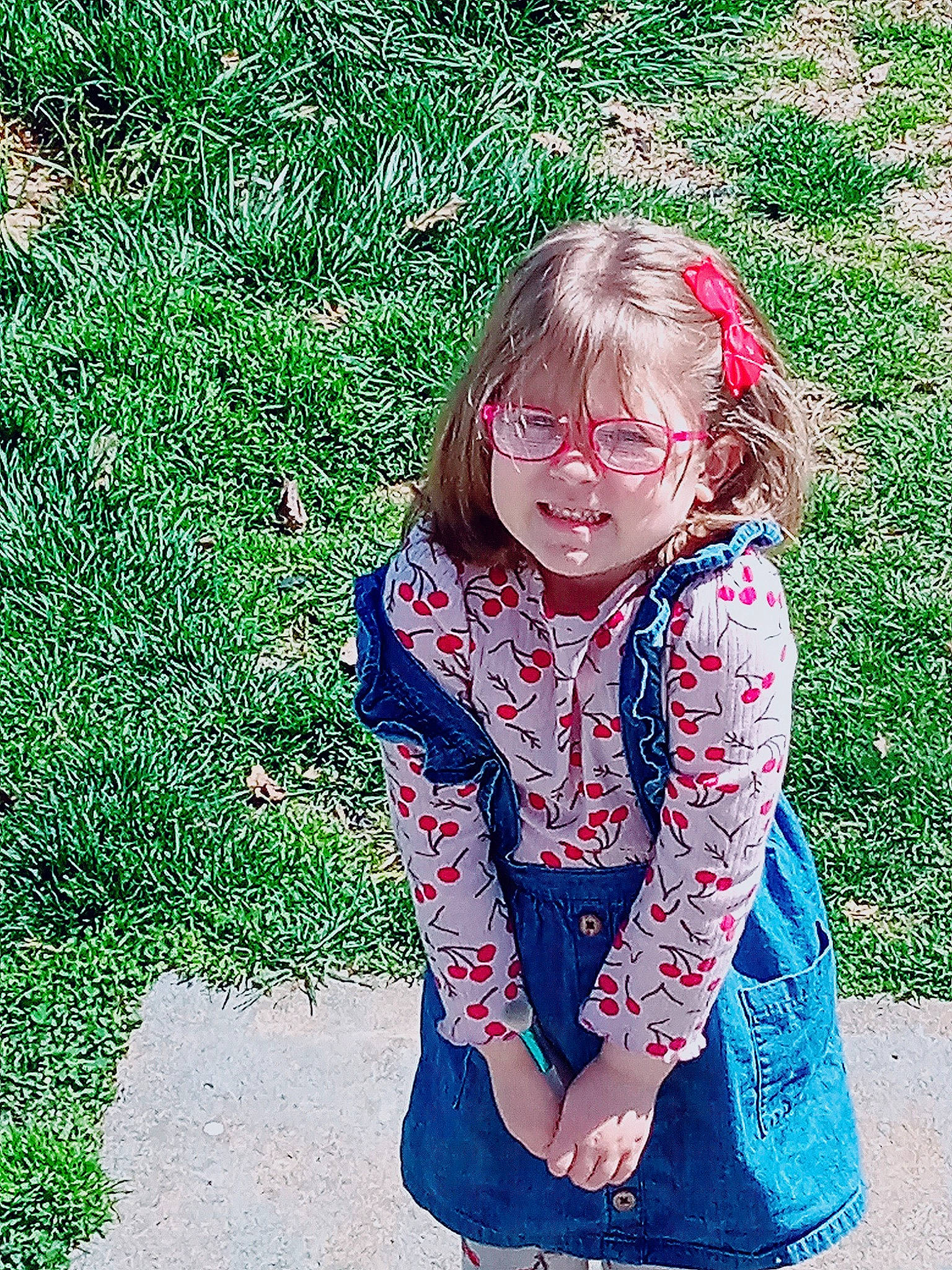 Avalyn joined the competition — help win amazing prizes! baby_toddler_clothing, child, child_model, day_dress, electric_blue, eyewear, fun, grass, happy, magenta, pattern, people_in_nature, person, play, portrait_photography, sitting, sleeve, smile, toddler