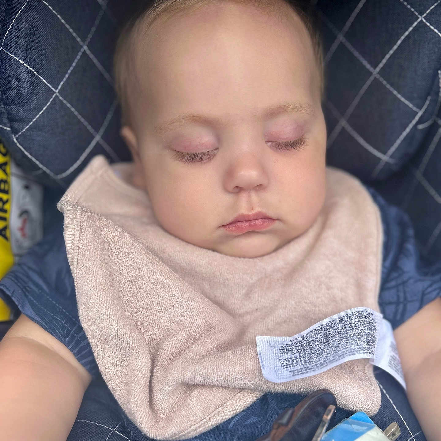 Ralphie Lee is registered to the contest to win money with this photo: baby, bib, car_seat, card, child, closeup, clothing, cushion, face, head, indoors, infant, keys, peaceful, person, portrait, seat, sleeping, soft, young