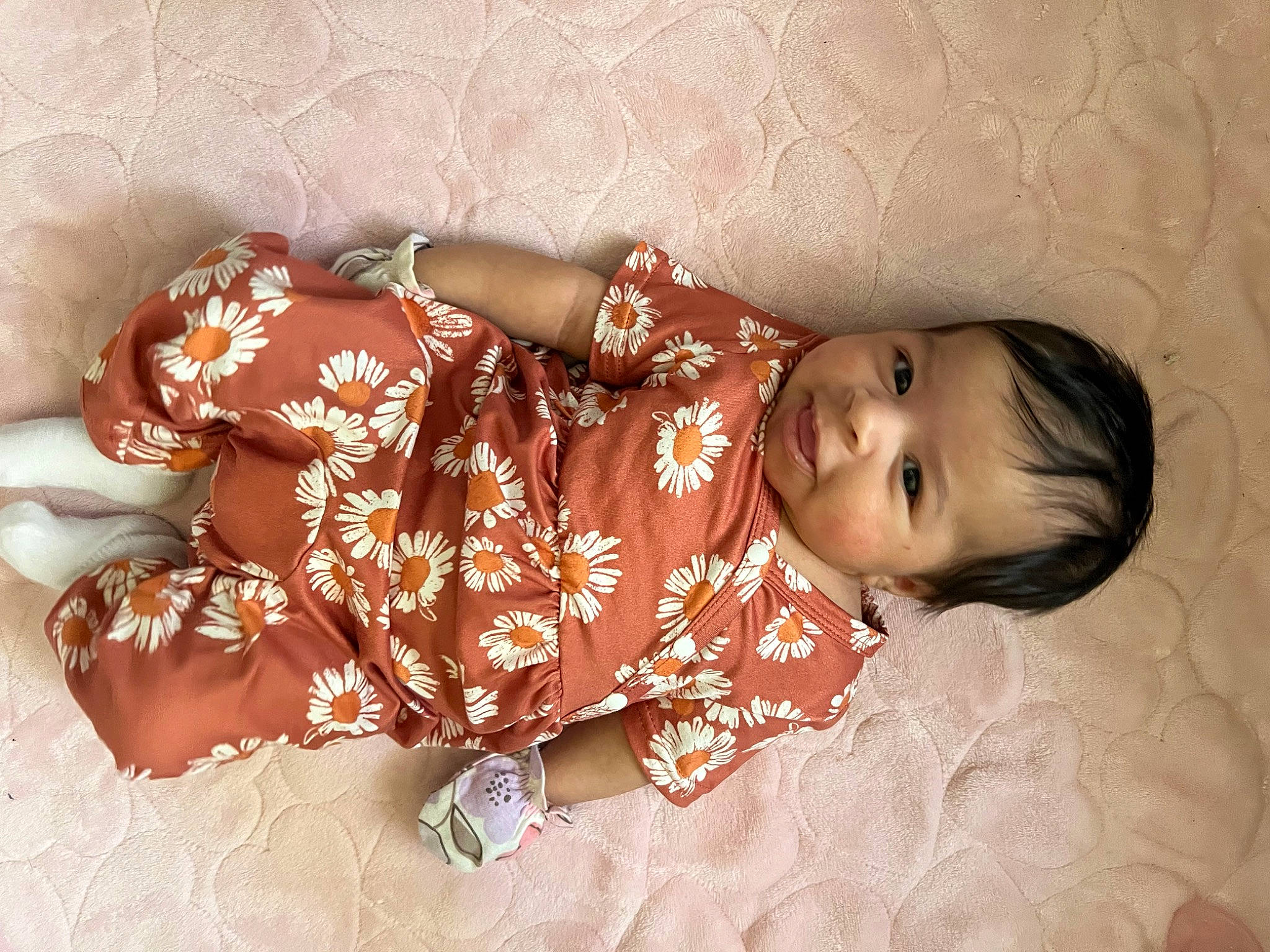 Jocelyn joined the competition — help win amazing prizes! baby, baby_toddler_clothing, bedding, bedtime, child, comfort, eye, flooring, human_leg, linens, nightwear, pattern, peach, person, room, sitting, skin, sleeve, textile, thigh