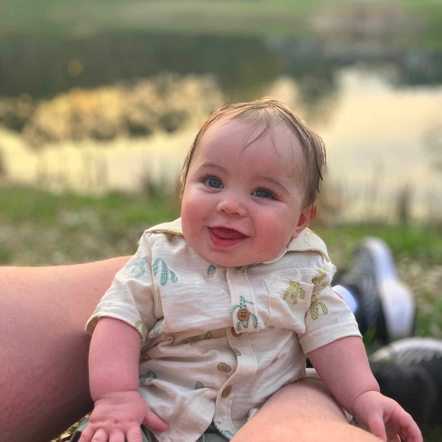Damon joined the competition — help win amazing prizes! baby, candid, casual_clothing, child, face, grass, hand, happy, legs, nature, outdoor, person, pond, portrait, relaxed, short_sleeves, sitting, smiling, summer, sunlight