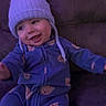 Damon is registered to the contest to win money with this photo: arms, baby, bear_pattern, blue_onesie, child, couch, cozy, cute, expression, face, happy, indoor, infant, knitted_hat, portrait, sitting, smiling, soft_lighting, warm_clothing, young_child