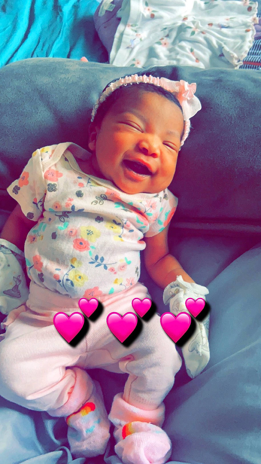 Keilani Bush is registered to the contest to win money with this photo: baby, baby_products, baby_toddler_clothing, cheek, child, comfort, face, fun, happy, head, linens, magenta, person, pink, purple, sitting, skin, sleeve, smile, toddler