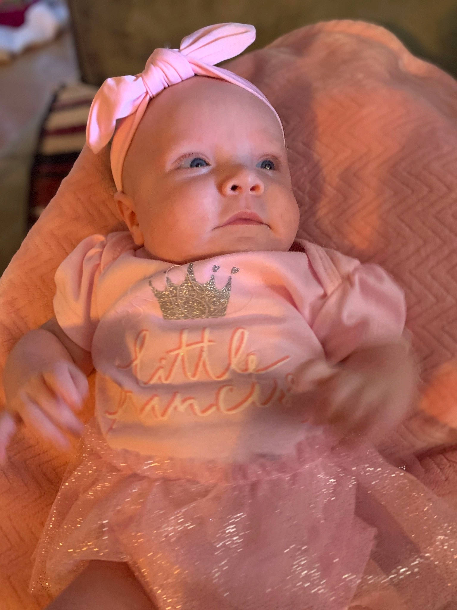 Leslie joined the competition — help win amazing prizes! baby, baby_products, baby_toddler_clothing, cheek, child, event, eye, fashion_accessory, fun, grass, happy, human_body, iris, lip, peach, person, pink, sitting, skin, sleeve