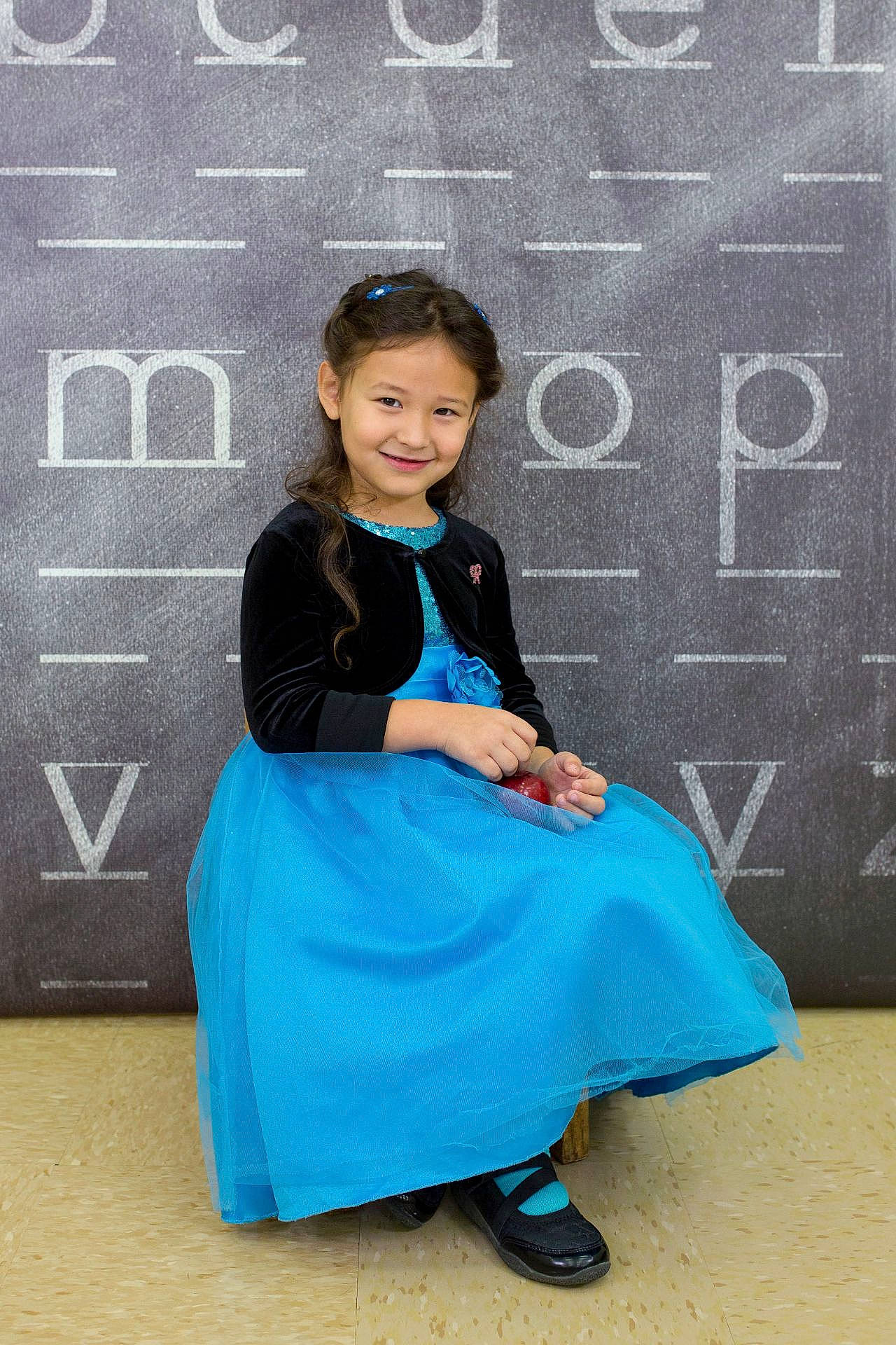 Elina is registered to the contest to win money with this photo: blue, child, clothing, costume, dress, electric_blue, fun, girl, joy, lady, outerwear, person, product, sitting, smile, standing, textile