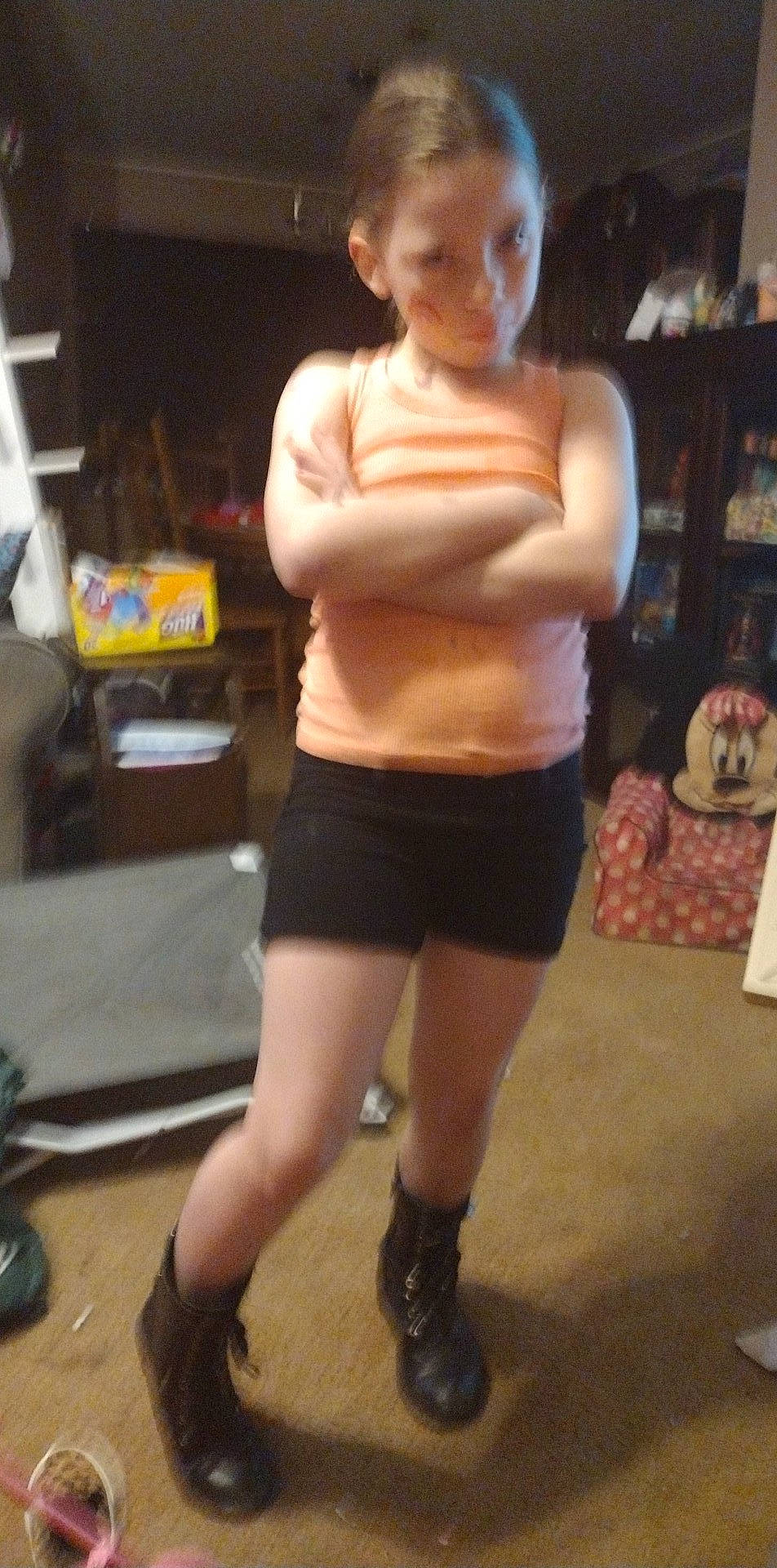 Jazzmyn is registered to the contest to win money with this photo: abdomen, barechested, calf, chest, elbow, flooring, hip, human_leg, knee, leg, navel, person, shelf, shoe, shorts, sleeveless_shirt, sportswear, thigh, trunk, waist