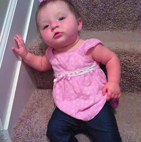 Harbor is registered to the contest to win money with this photo: arm, baby_toddler_clothing, cheek, eye, eyebrow, face, gesture, hair, happy, head, human_body, iris, joint, lip, mouth, neck, nose, person, skin, sleeve