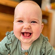 Lennie participe au concours pour gagner de l'argent avec cette photo : baby, smiling, child, face, green_clothing, drool, indoor, portrait, happy, cute, infant, ruffles, buttoned_shirt, closeup, young, person, skin, eyes, mouth, head