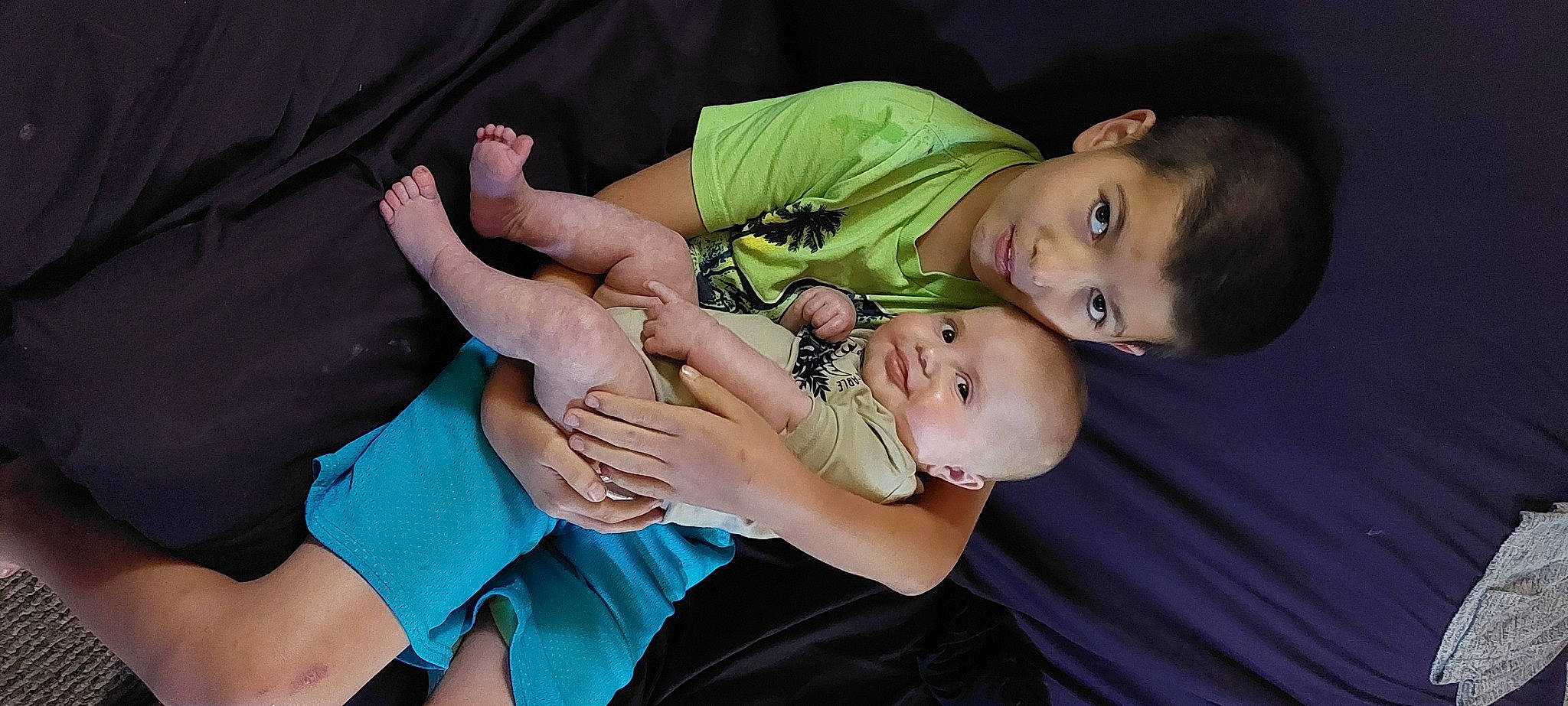 Ryley is registered to the contest to win money with this photo: abdomen, arm, baby, chest, child, comfort, event, finger, flash_photography, fun, gesture, grass, hand, happy, leg, nail, person, sitting, smile, thumb