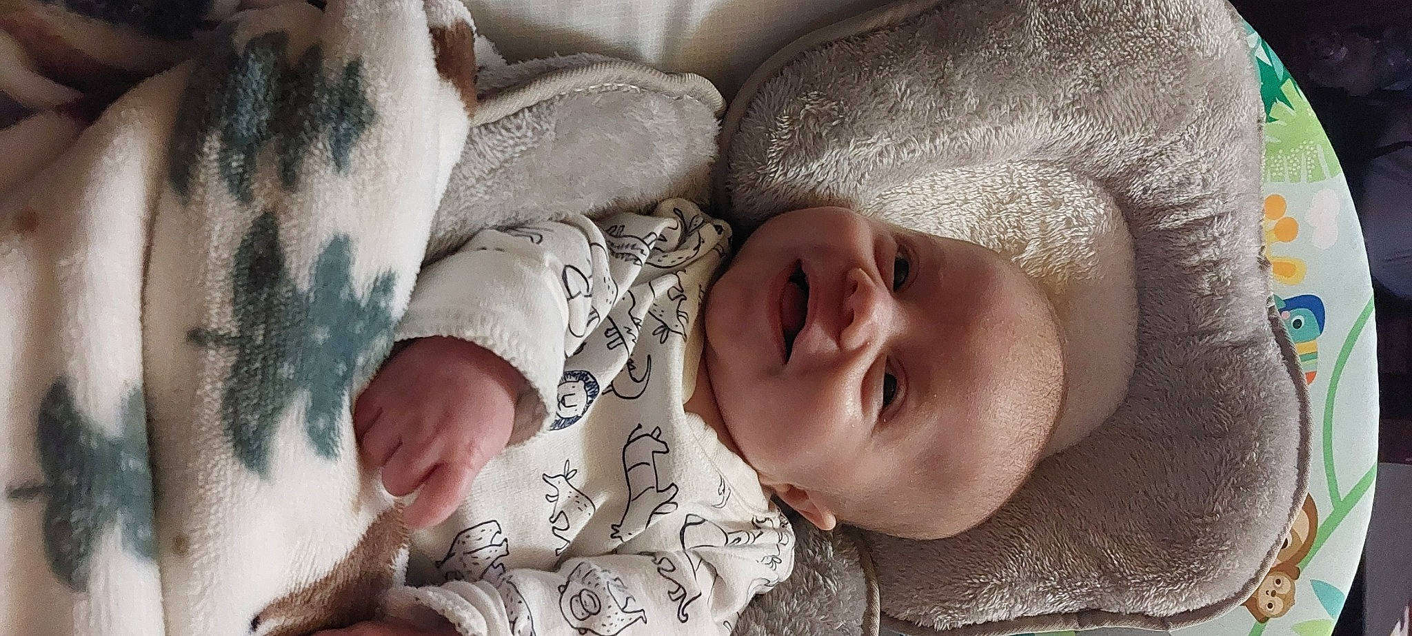 Ryley is registered to the contest to win money with this photo: arm, baby, baby_toddler_clothing, cheek, comfort, eye, eyebrow, eyelash, finger, gesture, hand, headgear, human_body, lip, mouth, nose, person, skin, sleeve, textile