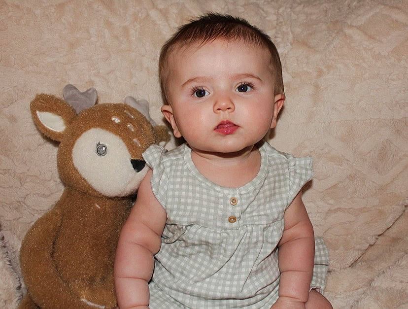 Ivey is registered to the contest to win money with this photo: baby, baby_toddler_clothing, cheek, comfort, ear, eyelash, fawn, happy, head, human_body, iris, nose, pattern, person, skin, sleeve, stuffed_toy, t_shirt, toddler, toy