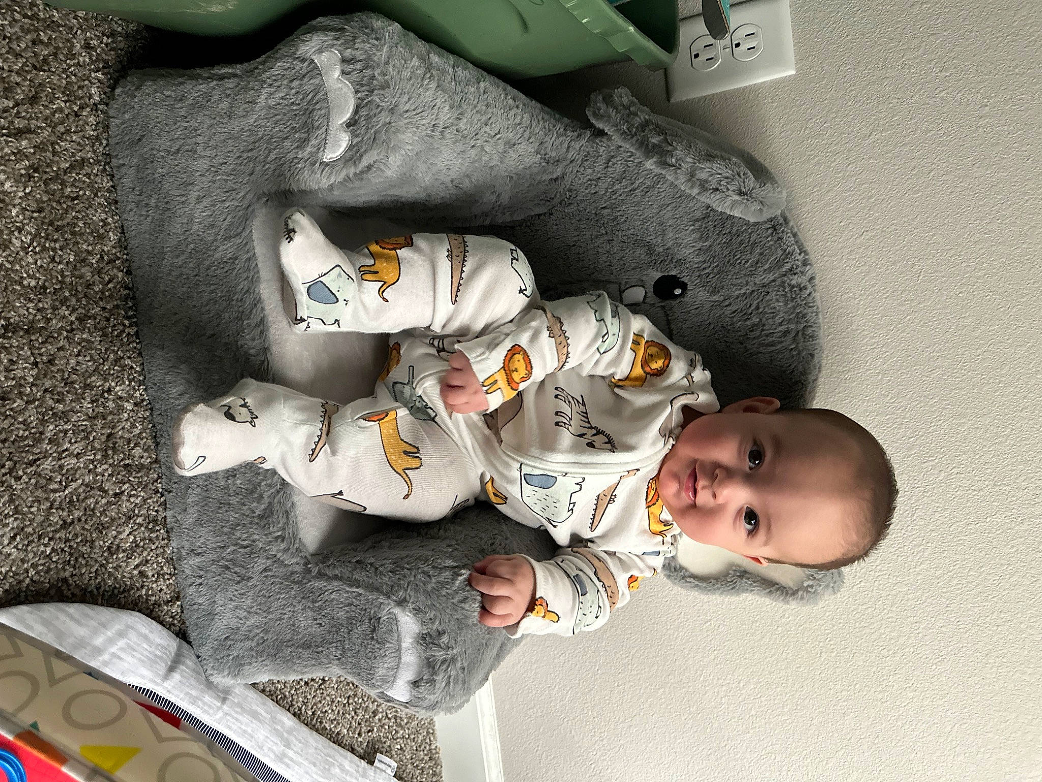 Aries is registered to the contest to win money with this photo: baby, baby_products, baby_toddler_clothing, carmine, child, comfort, face, head, nap, person, room, sitting, toddler