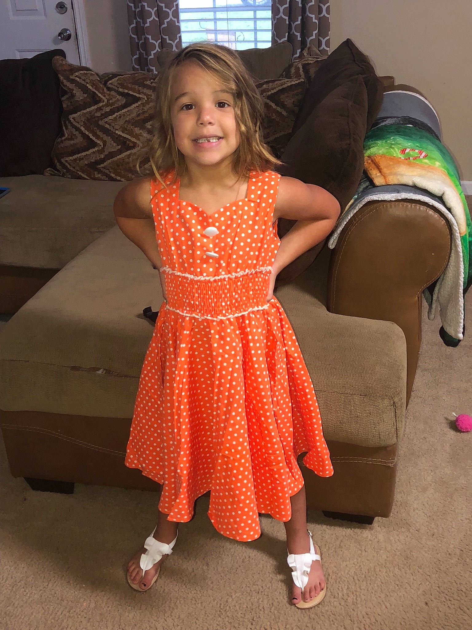 Karleigh is registered to the contest to win money with this photo: child, child_model, design, dress, fashion, flooring, footwear, fun, girl, joy, leg, orange, pattern, person, polka_dot, shoe, textile, toddler
