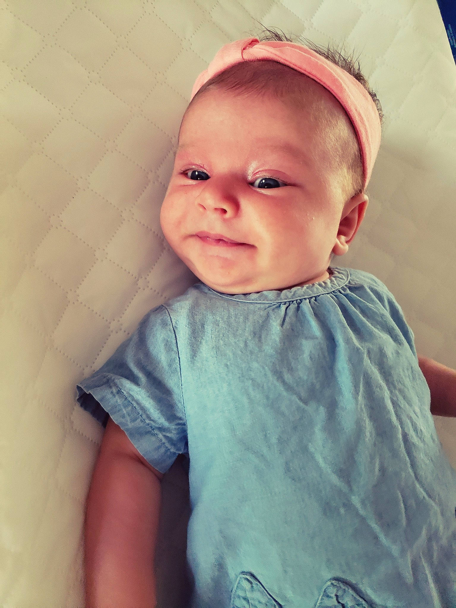 Mileena is registered to the contest to win money with this photo: baby, cheek, child, chin, eye, eyebrow, face, facial_expression, forehead, hair_accessory, head, headgear, iris, lip, mouth, nose, person, pink, skin, smile