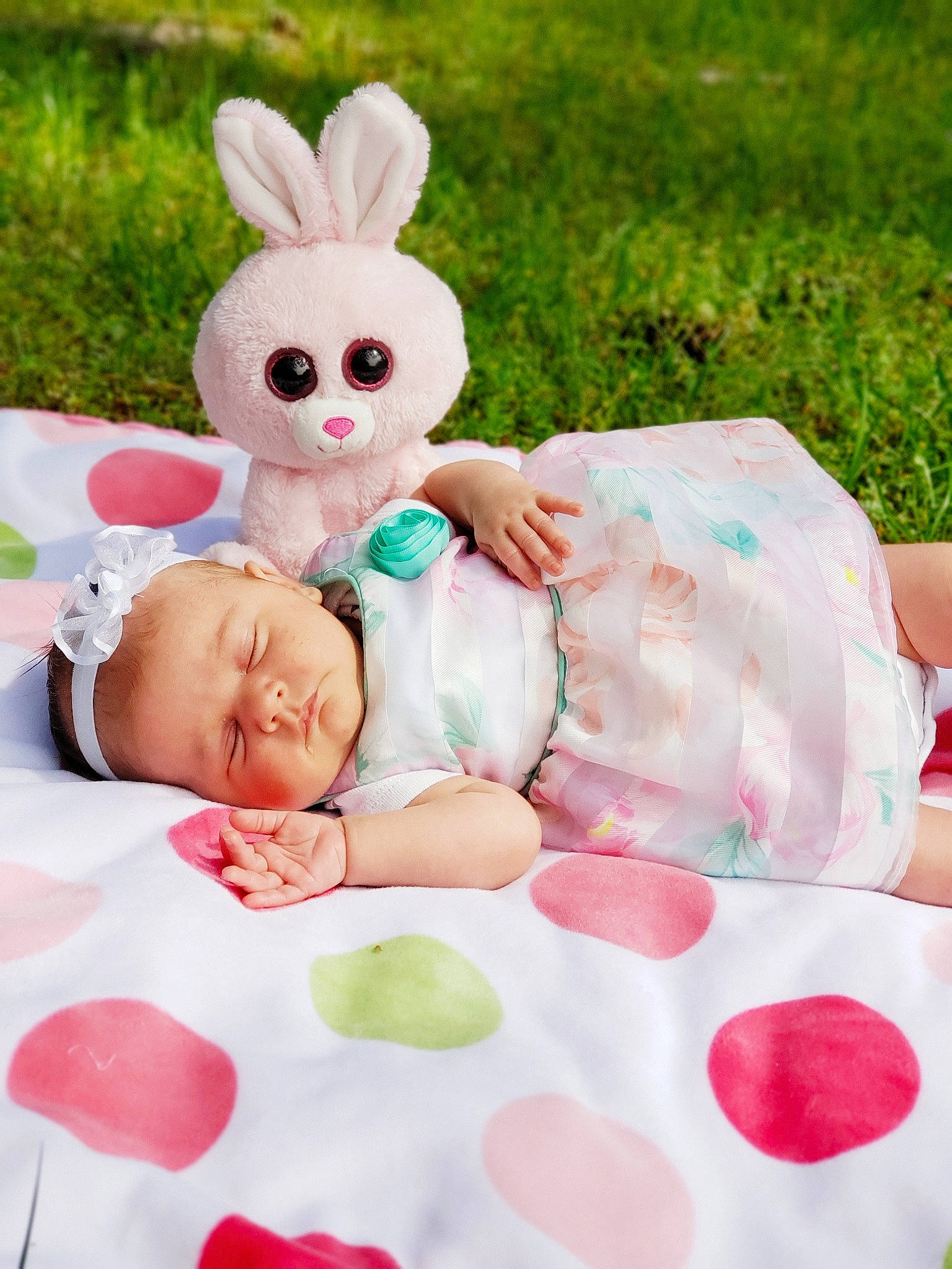 Mileena is registered to the contest to win money with this photo: baby, child, ear, easter, easter_bunny, event, holiday, person, pink, rabbit, rabbits_and_hares, toddler
