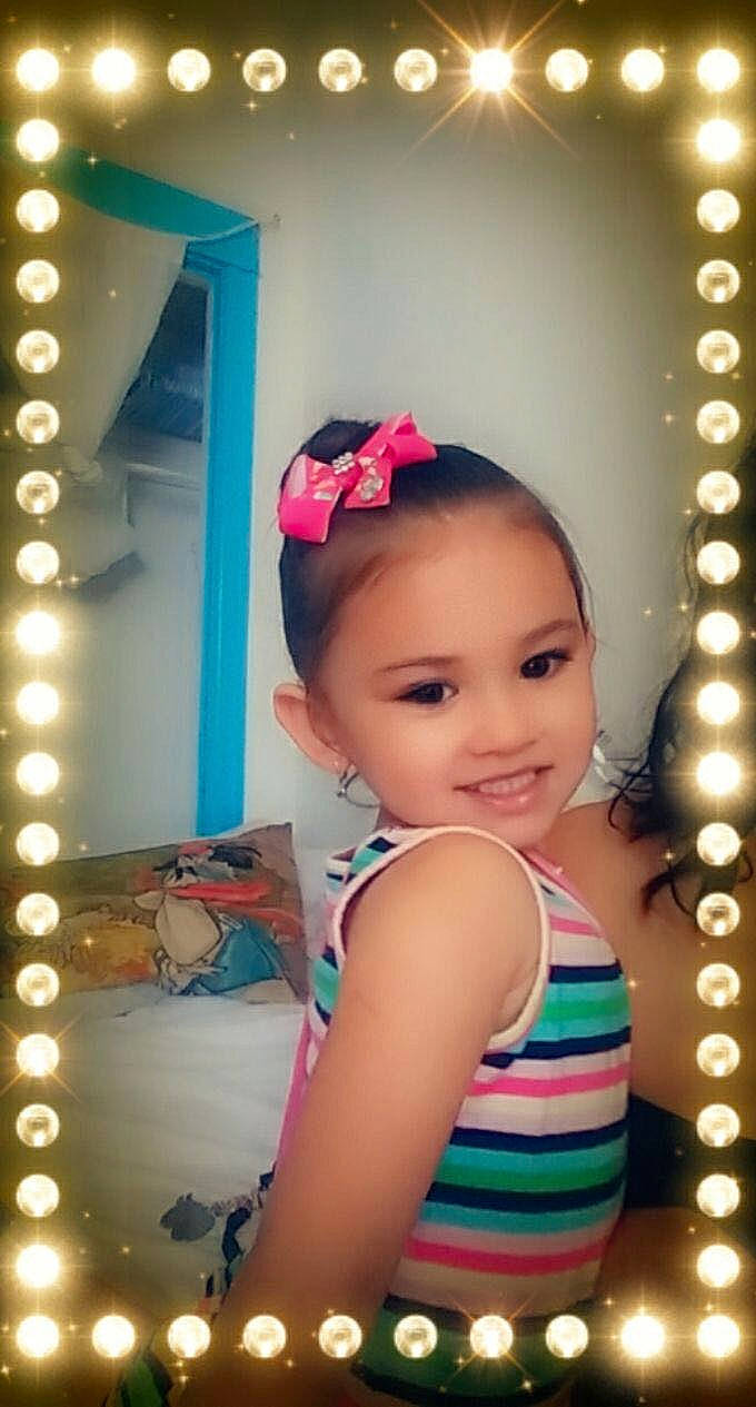 Baby is registered to the contest to win money with this photo: baby, child, ear, fashion_accessory, hair_accessory, happy, headband, headgear, joy, person, pink, smile, toddler