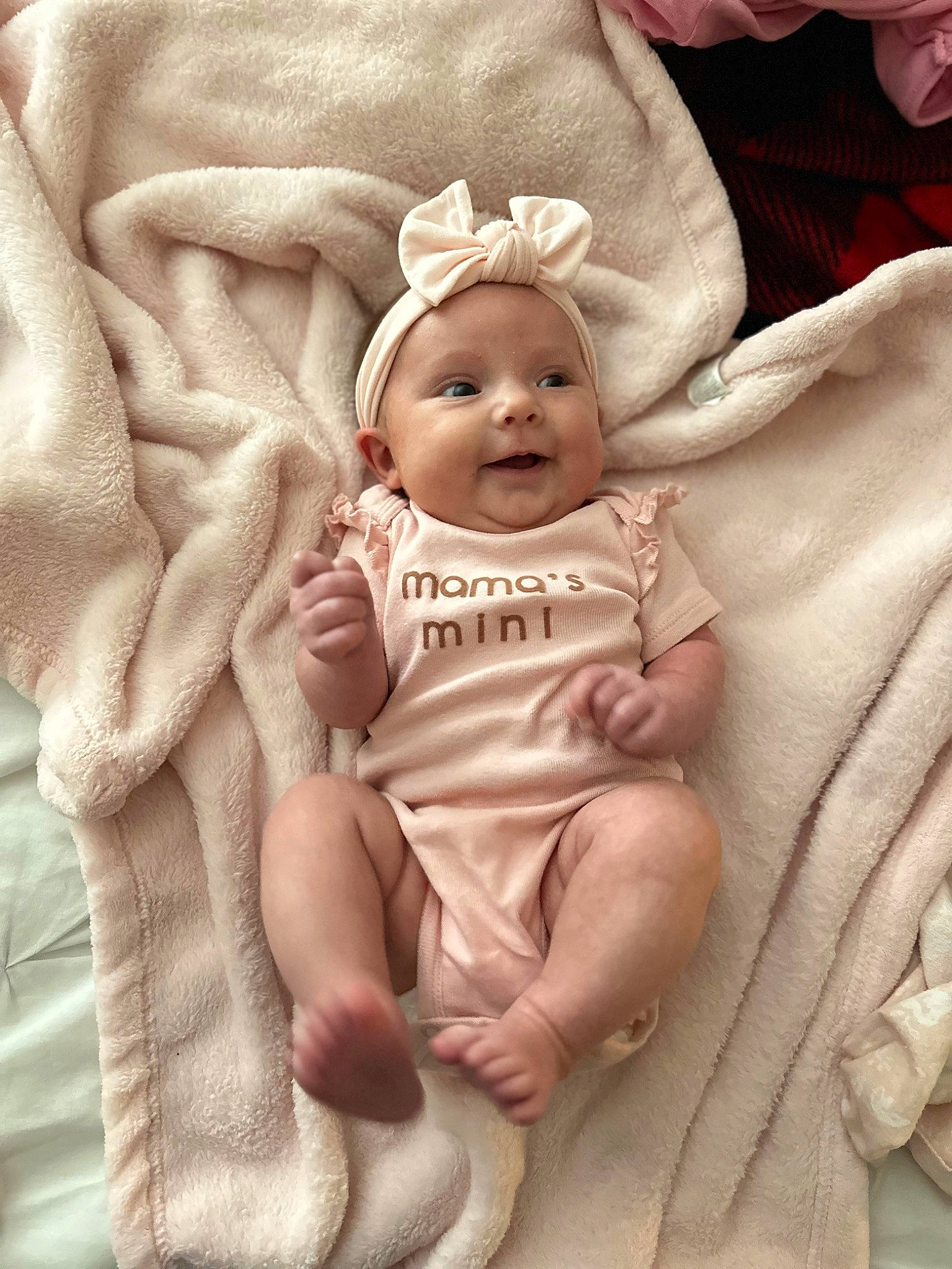 Kinzley joined the competition — help win amazing prizes! baby, baby_products, baby_sleeping, baby_toddler_clothing, cheek, child, comfort, fashion_accessory, happy, linens, pattern, peach, person, pink, portrait_photography, sitting, skin, sleeve, smile, thumb