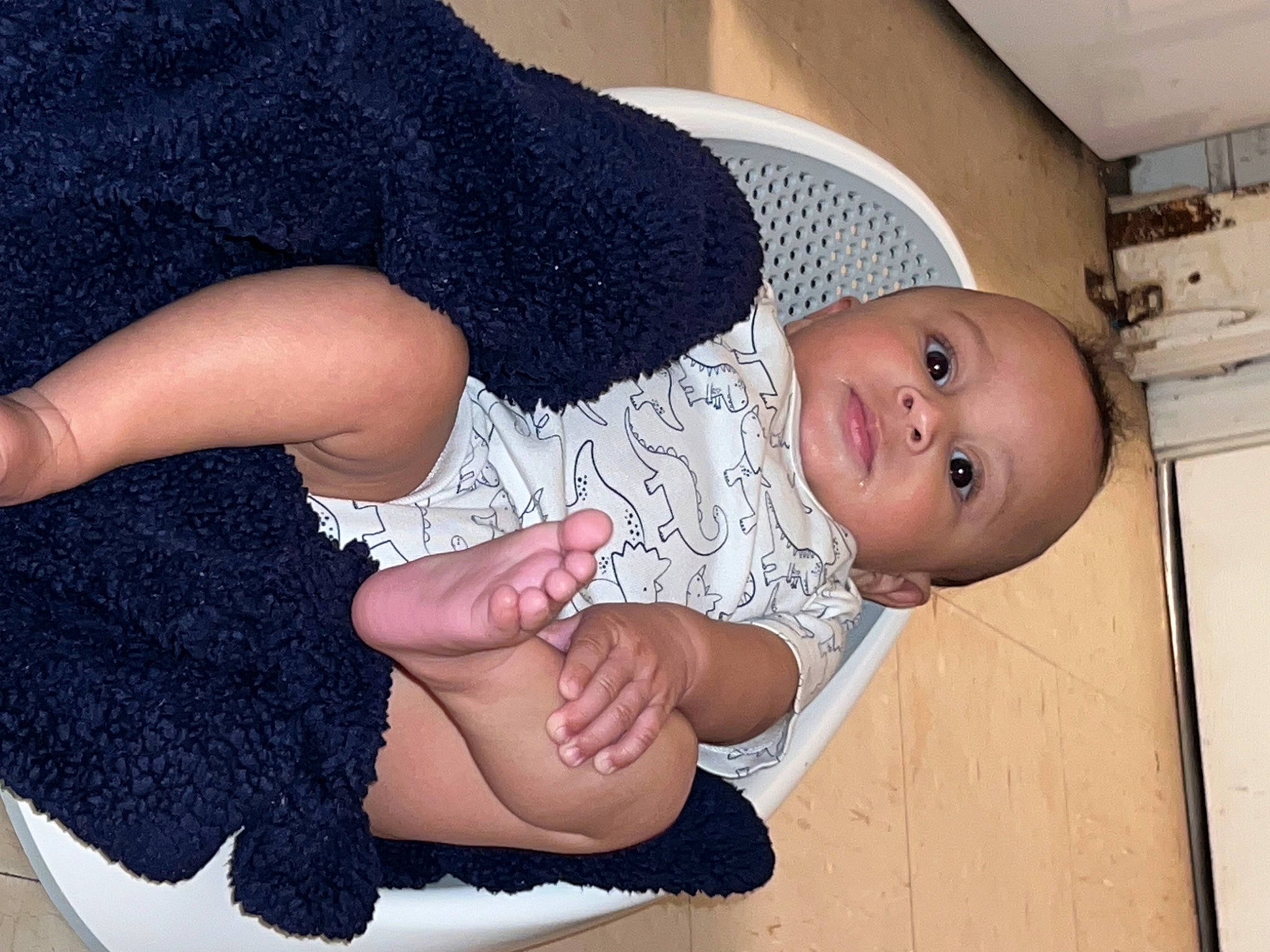Kylan joined the competition — help win amazing prizes! baby, baby_toddler_clothing, child, comfort, finger, foot, gesture, human_body, human_leg, joint, knee, leg, nail, pattern, person, sleeve, smile, thigh, thumb, toddler