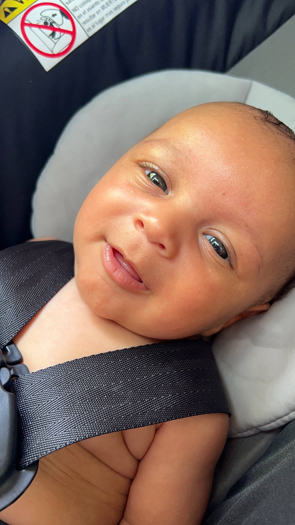 Kylan is registered to the contest to win money with this photo: baby, cap, cheek, chest, chin, close_up, comfort, eye, eyebrow, eyelash, happy, hat, iris, lip, mouth, nail, nose, person, skin, smile