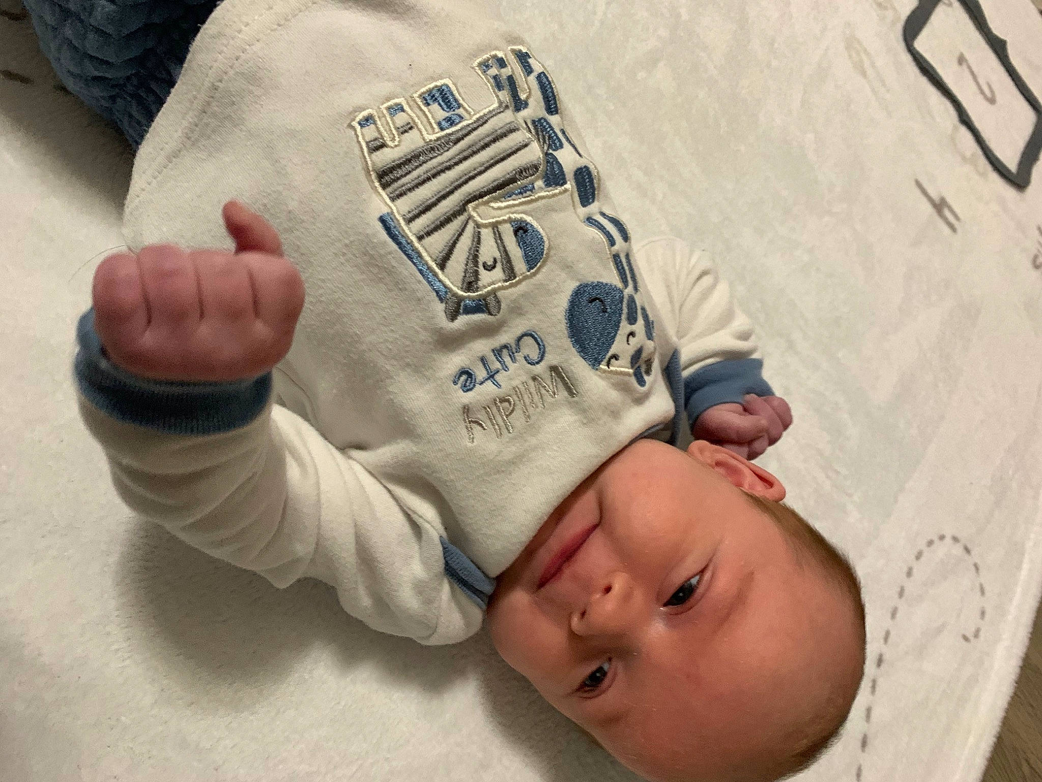 Bjorn joined the competition — help win amazing prizes! baby, baby_toddler_clothing, child, comfort, facial_expression, finger, font, gesture, happy, head, linens, organ, pattern, person, product, room, sleeve, thumb, toddler