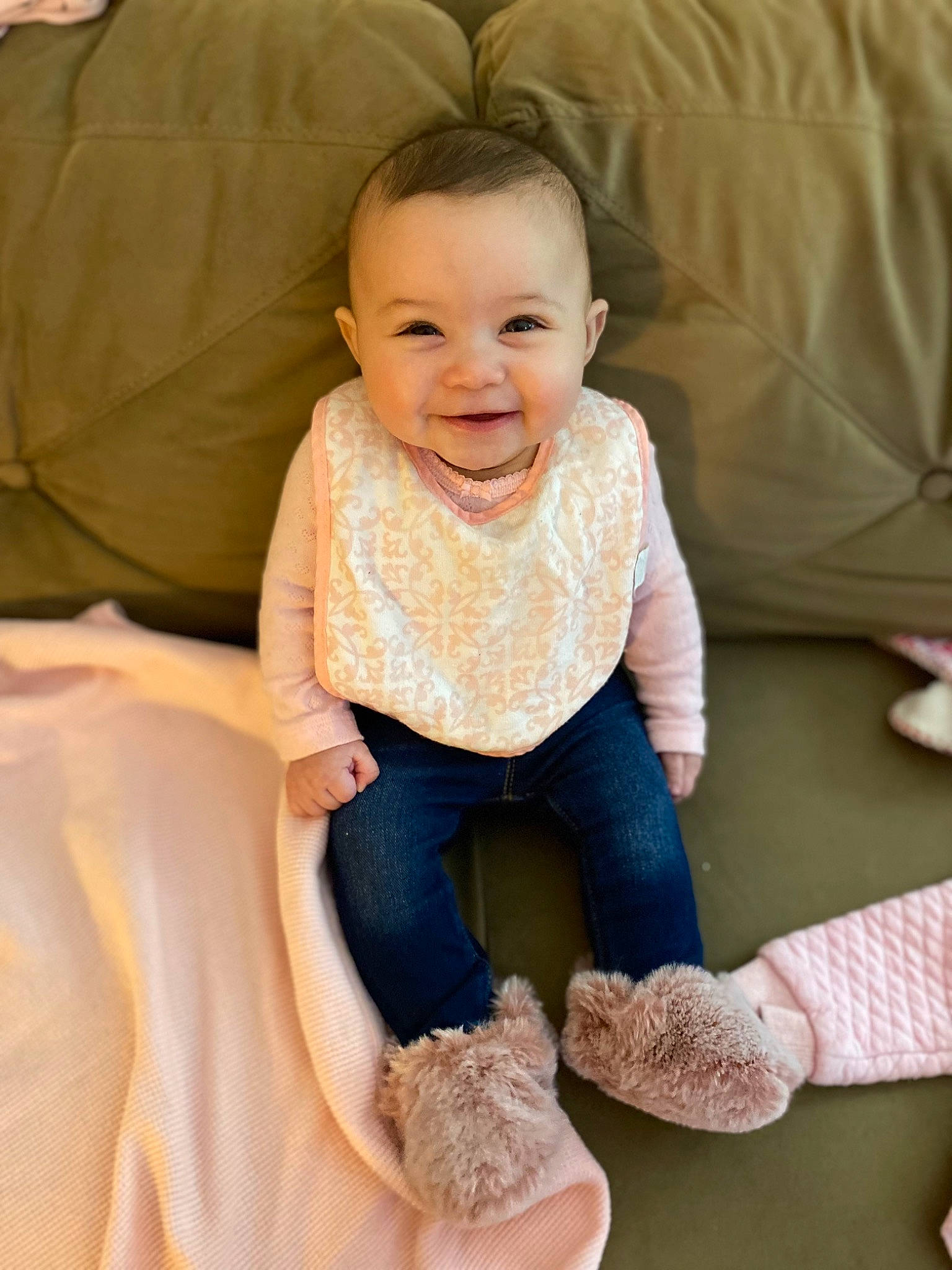 Eliana joined the competition — help win amazing prizes! baby, baby_toddler_clothing, cheek, child, comfort, face, flooring, foot, fun, happy, head, joy, knee, linens, person, sitting, skin, sleeve, smile, sock