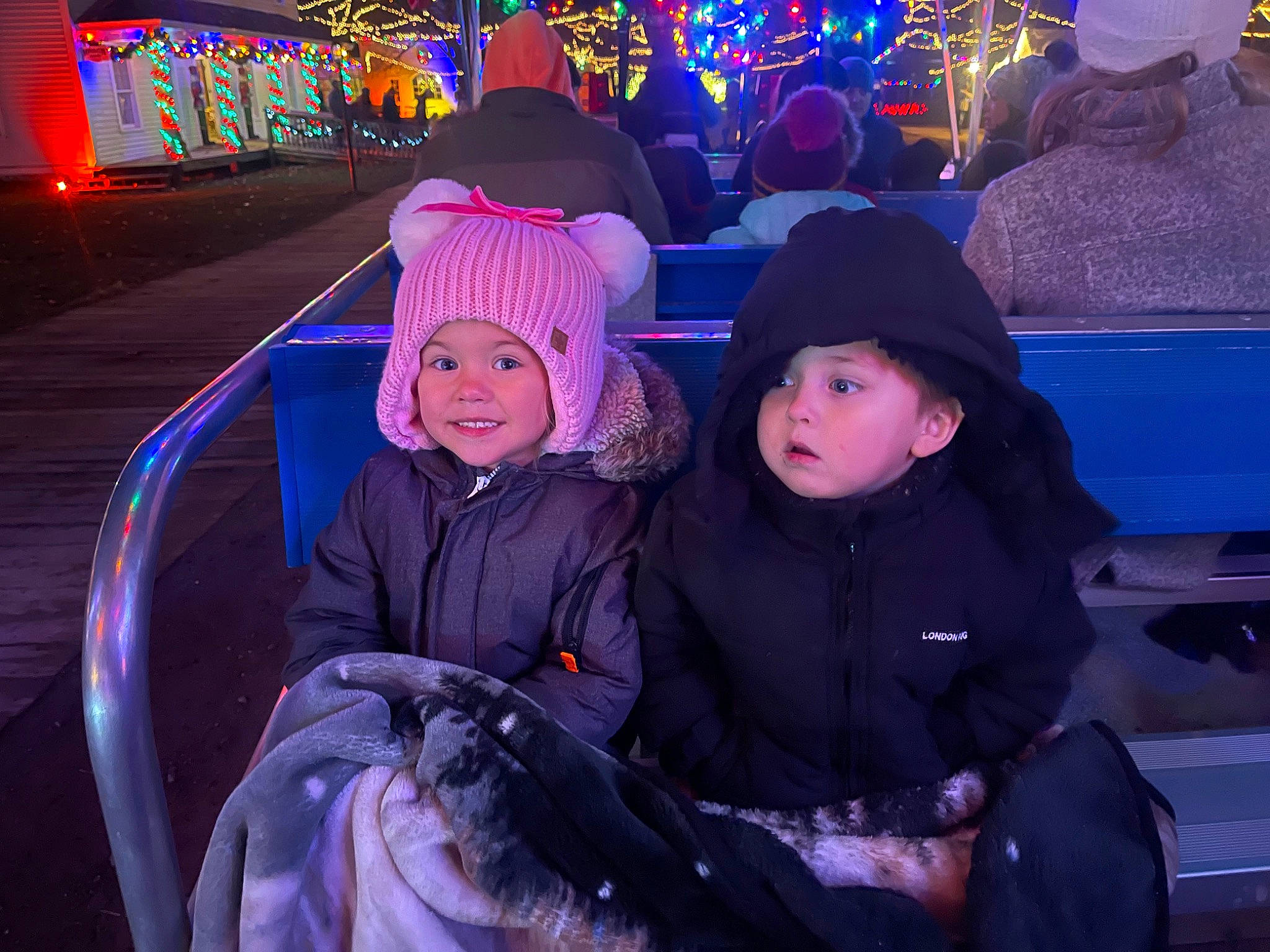 Mia is registered to the contest to win money with this photo: cap, costume_hat, electric_blue, entertainment, event, fun, hat, headgear, headwear, joy, leisure, light, luxury_vehicle, magenta, person, pink, purple, recreation, snapshot, toddler