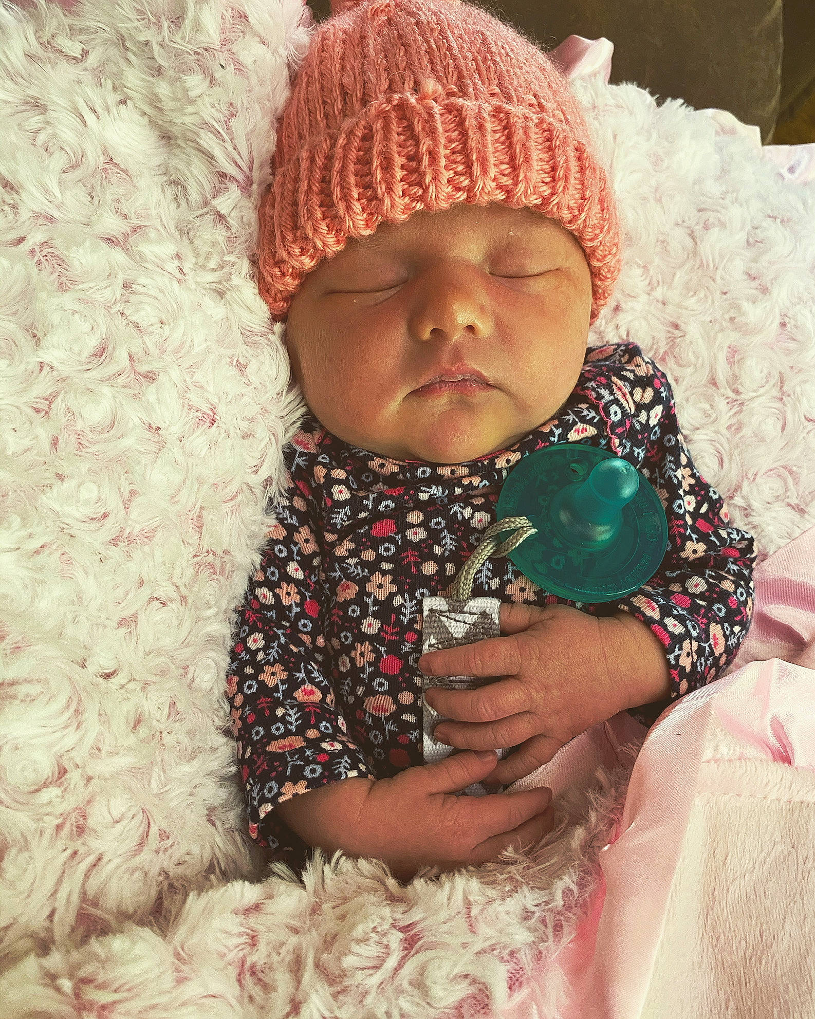 Bryer is registered to the contest to win money with this photo: baby, beanie, bonnet, cap, cheek, child, crochet, eye, fashion_accessory, hat, headgear, headwear, knit_cap, knitting, outerwear, person, pink, skin, smile, textile